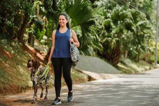 happy dog with trainer