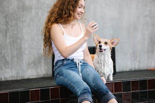 happy dog training with owner